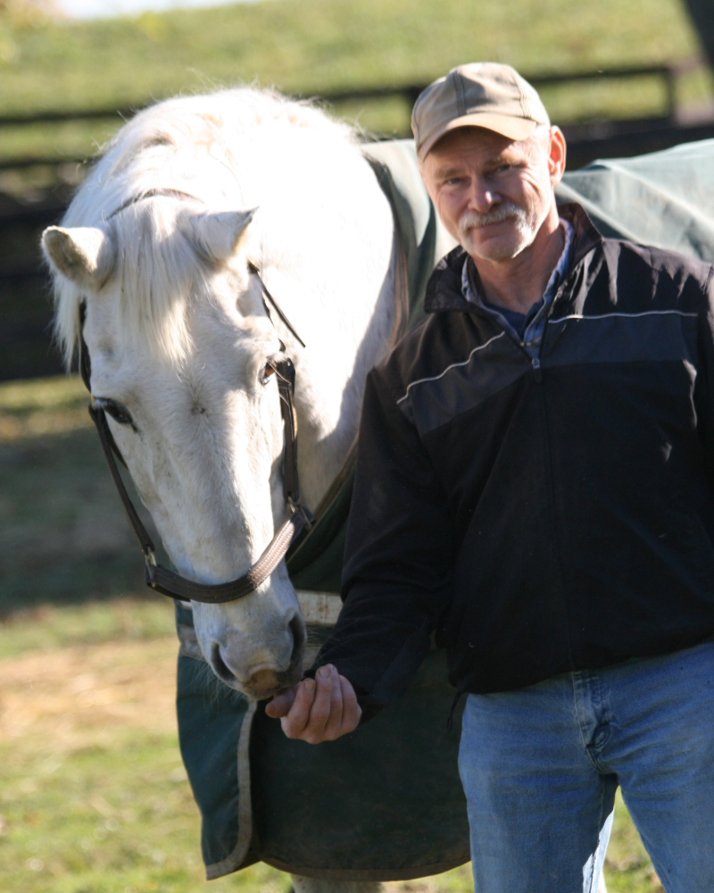 Dr. Ley and the Holsteiner grand prix jumper stallion R-Saluut II
